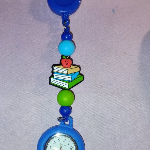 Clock Badge Reel- Books - Picture 1 of 4